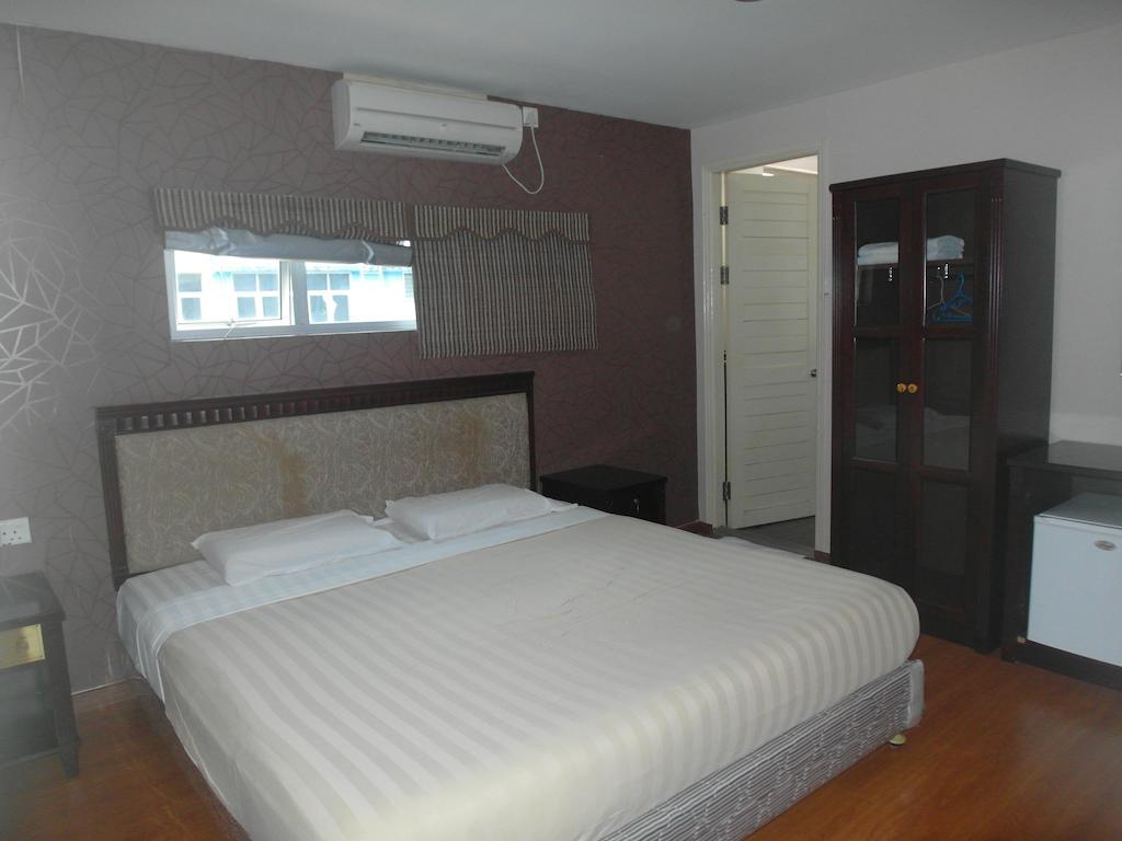 Dragon Inn Miri Quarto foto